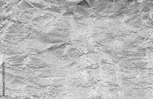 A highly detailed monochrome texture featuring dense, irregular horizontal lines, subtle wavy patterns, and an aged-surface effect in shades of white, gray, and black.