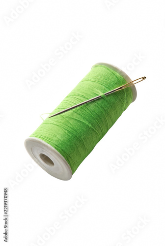 Spool of Lime Green Thread with a Sewing Needle