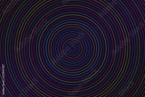 Vibrant neon concentric circles create a dynamic full frame pattern on a dark background
