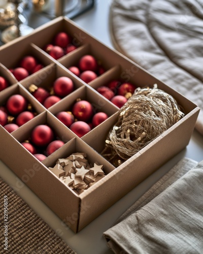 Red Christmas Baubles and String Lights in a Storage Box