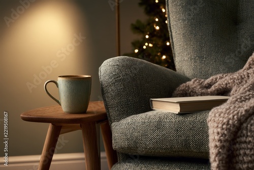 Cozy Reading Corner with Mug Book and a Knitted Blanket