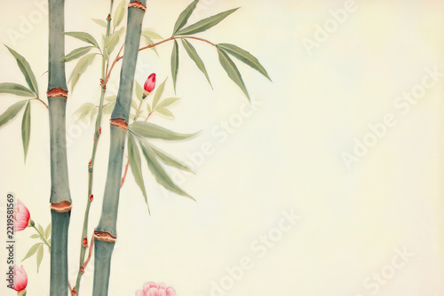Bamboo stalks with pink peony flowers on cream background