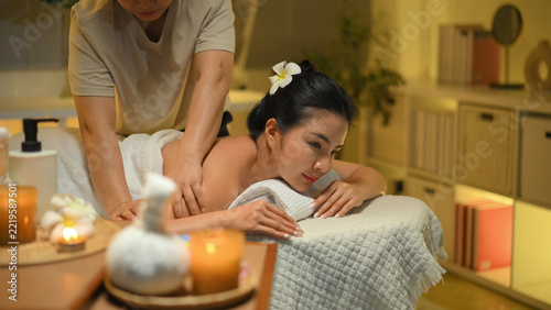 Photo set of Woman receiving shoulder massage at spa with warm light and deep relaxation mood