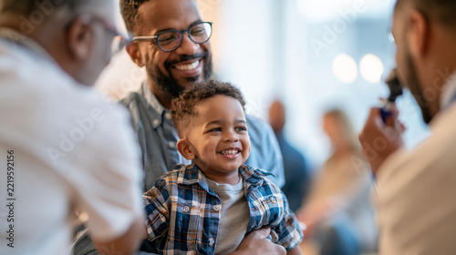 Young father reassuring preschool-aged son