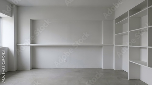 Empty bright room with white walls and light laminate flooring after renovation, ready for interior design