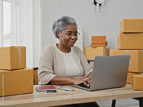 Elderly people selling goods online from home as a source of supplementary income.