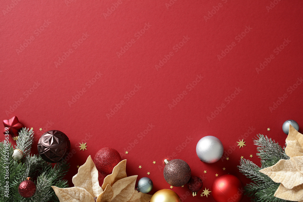 Fototapeta premium Christmas flat lay background with luxury red ornaments and copy