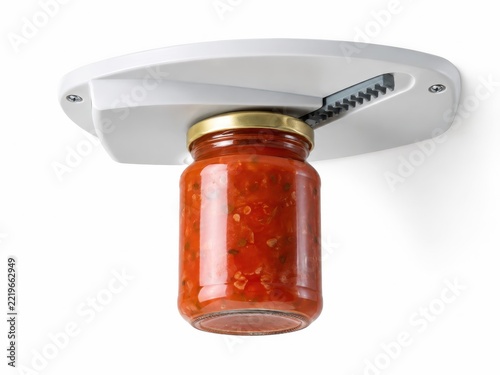 Fixed Under Cabinet Jar Opener Holding Tomato Sauce Jar Isolated on White Background