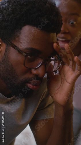African American married couple arguing at home bedroom angry wife screaming shouting at husband family conflict divorce quarrel marriage problem man ignoring gesture explaining relationship fight