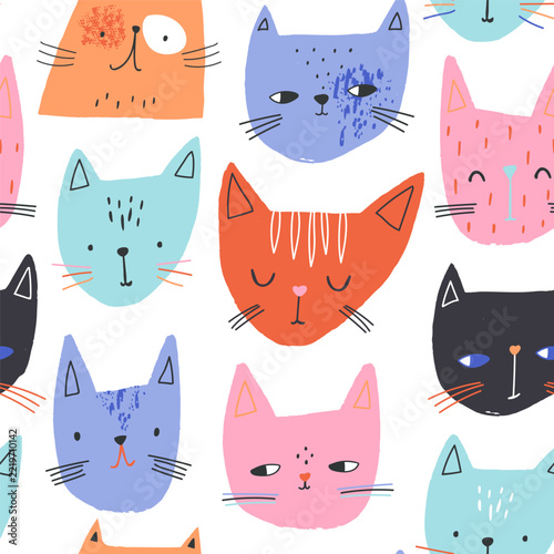 Cute artistic cats faces seamless pattern. Vector colorful relative childish background.