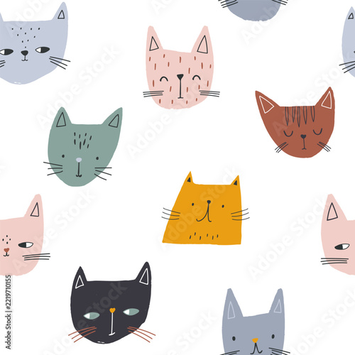 Cute artistic cats faces seamless pattern. Vector creative childish background.