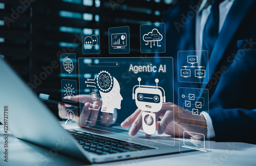 Agentic AI automation and autonomous workflow technology concept. Businessman using laptop, representing intelligent agents, decision making assistant, productivity, business innovation, AI coworker