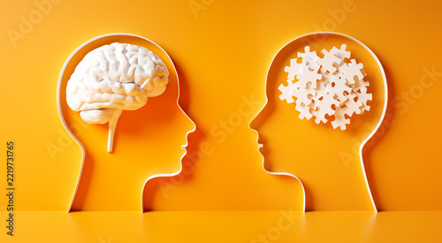 3D silhouette of a two heads with white chaotic puzzle pieces and brain on yellow background symbolizing mental confusion and mental health