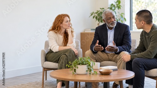 Mediator guiding a respectful discussion between two office colleagues