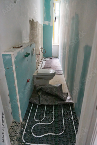 Bathroom Renovation Project With Underfloor Heating Installation In Historic Apartment Building