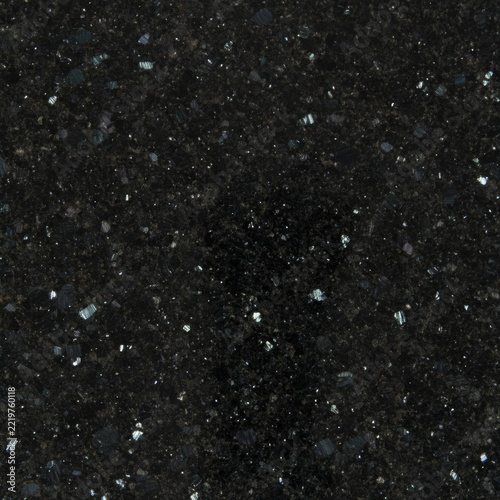 Black granite stone texture background with sparkling mineral crystals