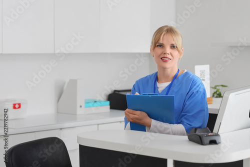 Healthcare administration and medical reception, nurse or receptionist workin...