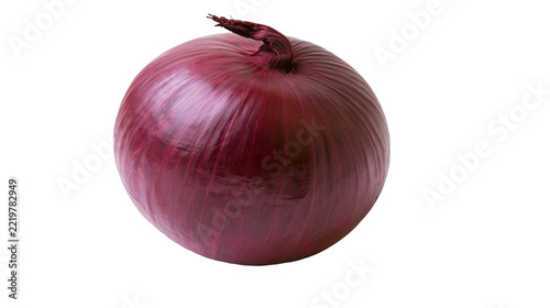 Whole fresh red onion with dry papery skin and stem