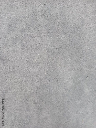 Light gray rough textured wall background