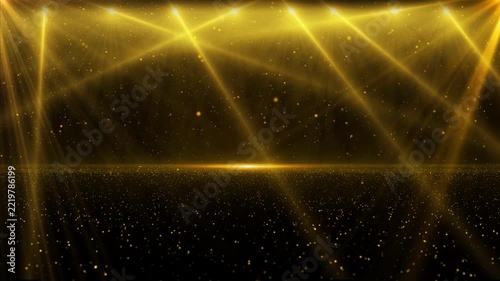 The shimmering golden lights on the awards stage