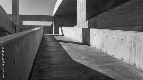 Modern Concrete Architectural Structure with Sharp Lines and Shadows in Black and White