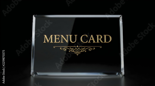 Elegant glass menu card sign with gold lettering isolated on a