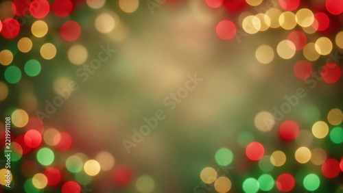 Colorful festive bokeh background with glowing red, green, gold, and orange light creating warm joyful atmosphere and soft abstract holiday decoration