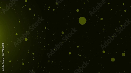 Abstract yellow light particles floating in dark space background with soft glow effect for digital design and modern motion graphics compositions