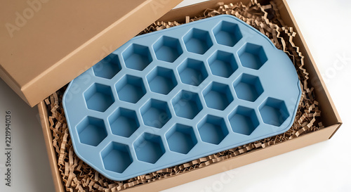 Hexagonal Ice Cube Tray in Blue Silicone with Packaging Mockup, blank spaces for text