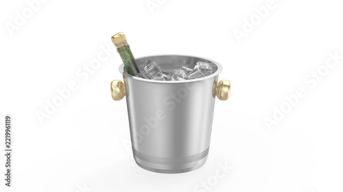 Sparkling wine bottle and ice cubes falling into a silver ice bucket