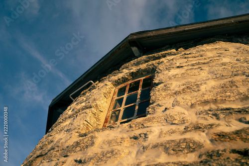 Old tower, shelter on the Skåla mountain summit. Peak of this mountain has a new one shelter also.