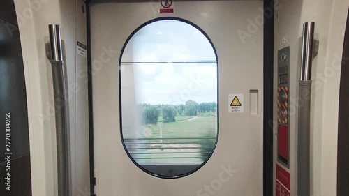 Window of high‑speed train traveling at high speed