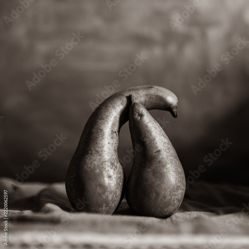 pears on a black background
