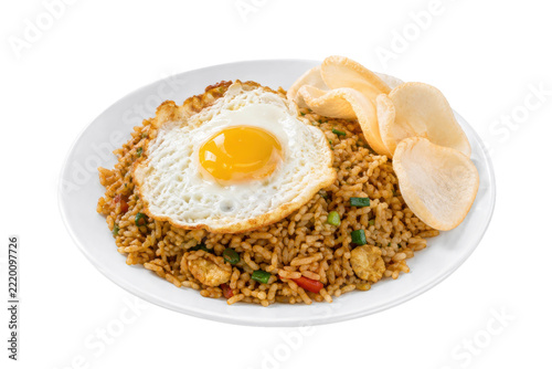 Fotografie Delicious Indonesian fried rice, known as Nasi Goreng, served on a white plate w