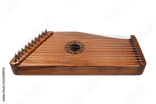 Obraz na plátně Traditional wooden zither, a stringed musical instrument, is captured in a studi