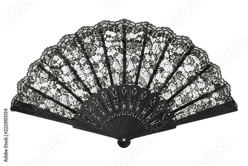 Obraz na plátně Elegant black lace folding hand fan with intricate floral patterns and carved wo