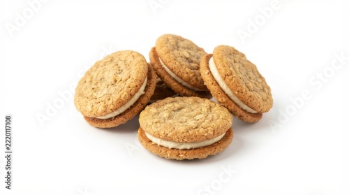 A small pile of cream-filled oatmeal sandwich cookies