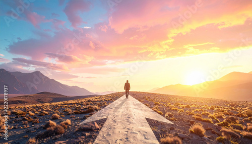A person walks along a path shaped like an arrow, symbolizing future success and personal growth. The sunset landscape evokes inspiration, ambition, and determination for a new professional journey.
