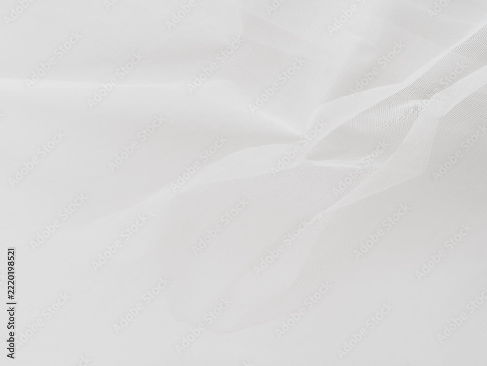 Fototapeta premium White translucent fabric texture with layered soft folds
