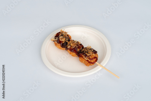 Battered chicken topped with sauce