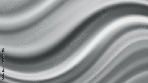 Smooth flowing silver waves with subtle light shifts during a gentle cinematic motion