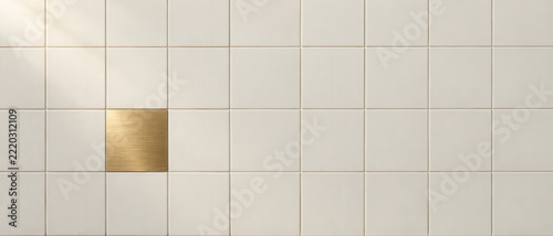 Single Golden Metal Tile in an Ivory Grid