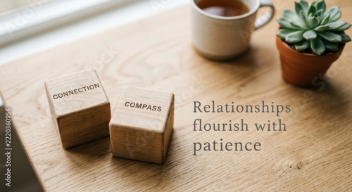 Wooden Blocks With Connection and Compass Words Near Tea Cup