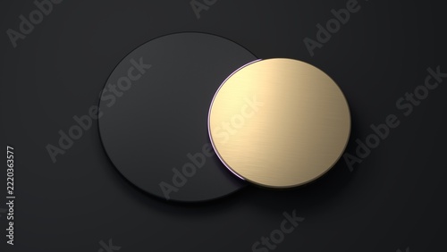 Brushed gold disc overlapped with black circle on dark black background