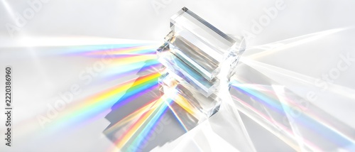 Transparent prism stack flare creating layered spectral patterns in studio