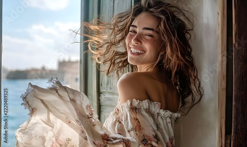 Joyful Woman in Flowing Dress by Open Window