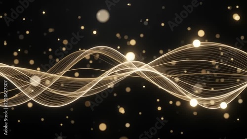 Abstract golden wave lines with glowing bokeh particles on black background