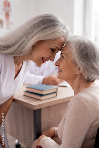  Nurse caring for elderly people