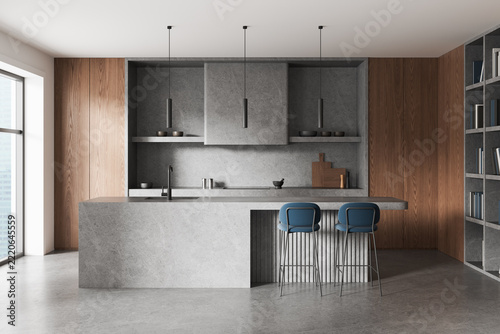 Contemporary interior design kitchen with walnut cabinetry, concrete island, pendant lights, shelving, and blue bar stools in an elegant home. 3D Rendering
