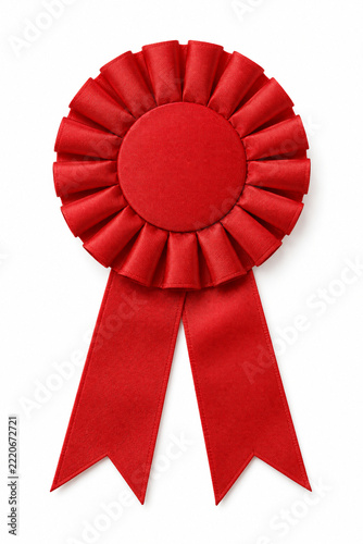 Red award rosette with blank center isolated on white